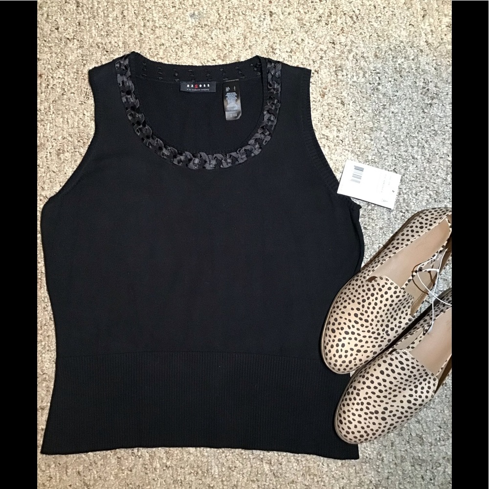 Women’s size large new with tags black sleeveless axcess  sweater